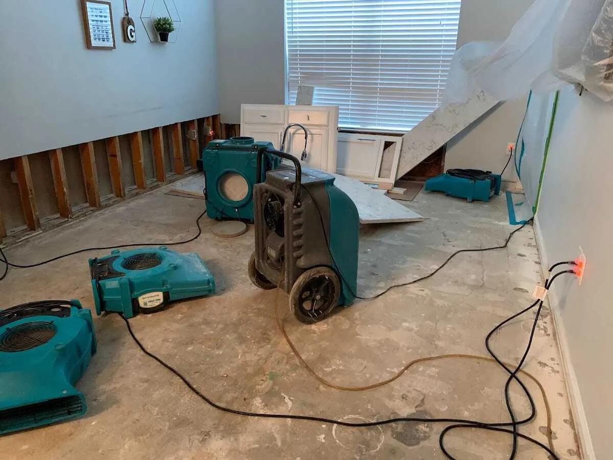Dehumidifier in flood-cut room for Water Damage Restoration in Othello